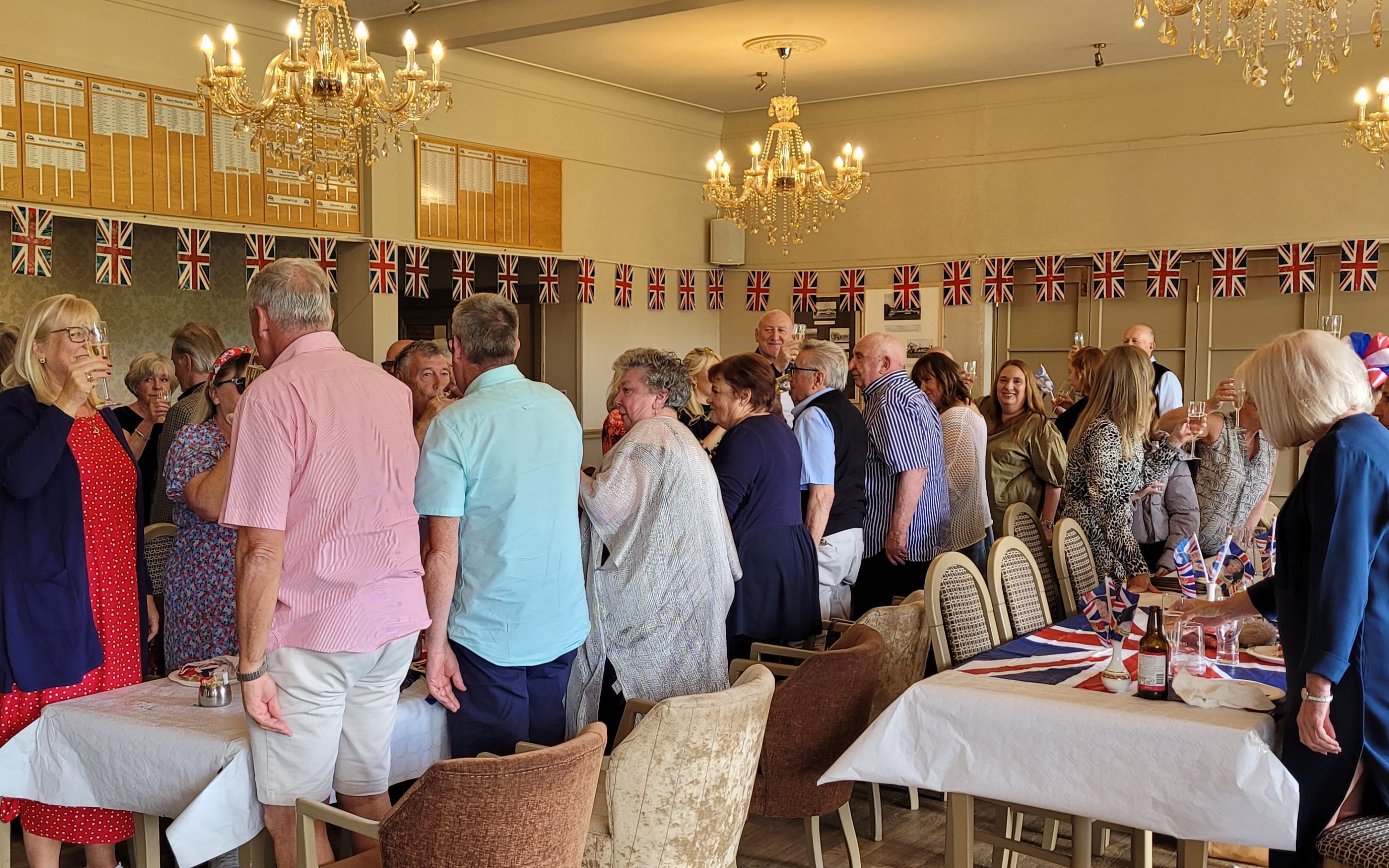 Members and Guests Toasting the Queen