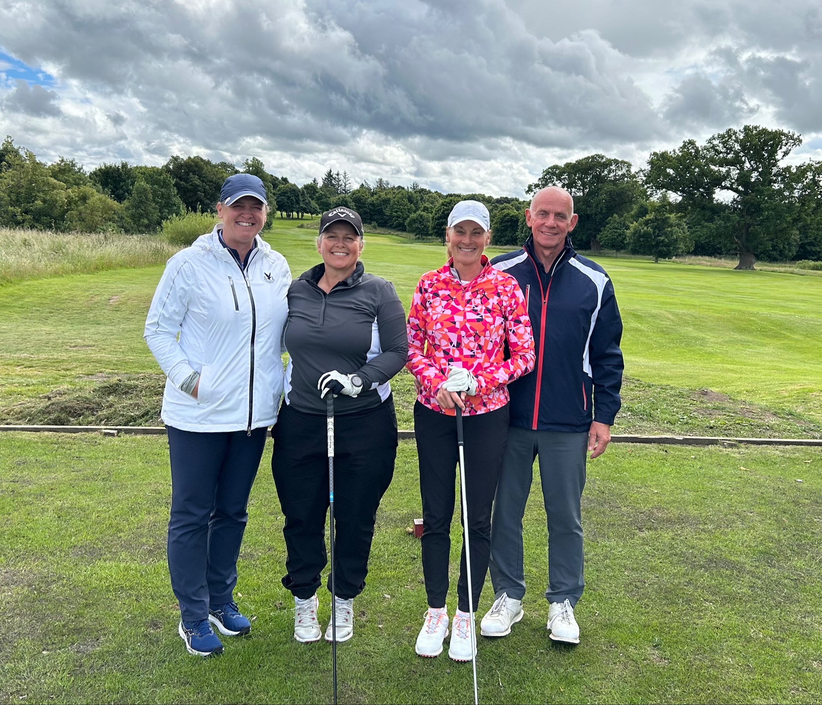 Finalists and their caddies Gail Mathieson and Kevin Sewell